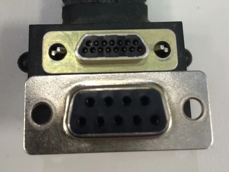 Close-up of 9-pin and 15-pin D-subminiature connectors